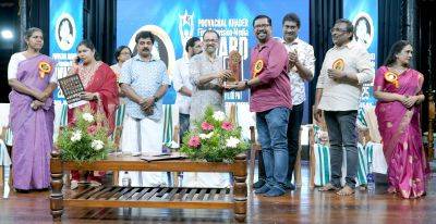 milma-receives-poovachal-khader-award-for-best-brand-advertising-english.jpeg
